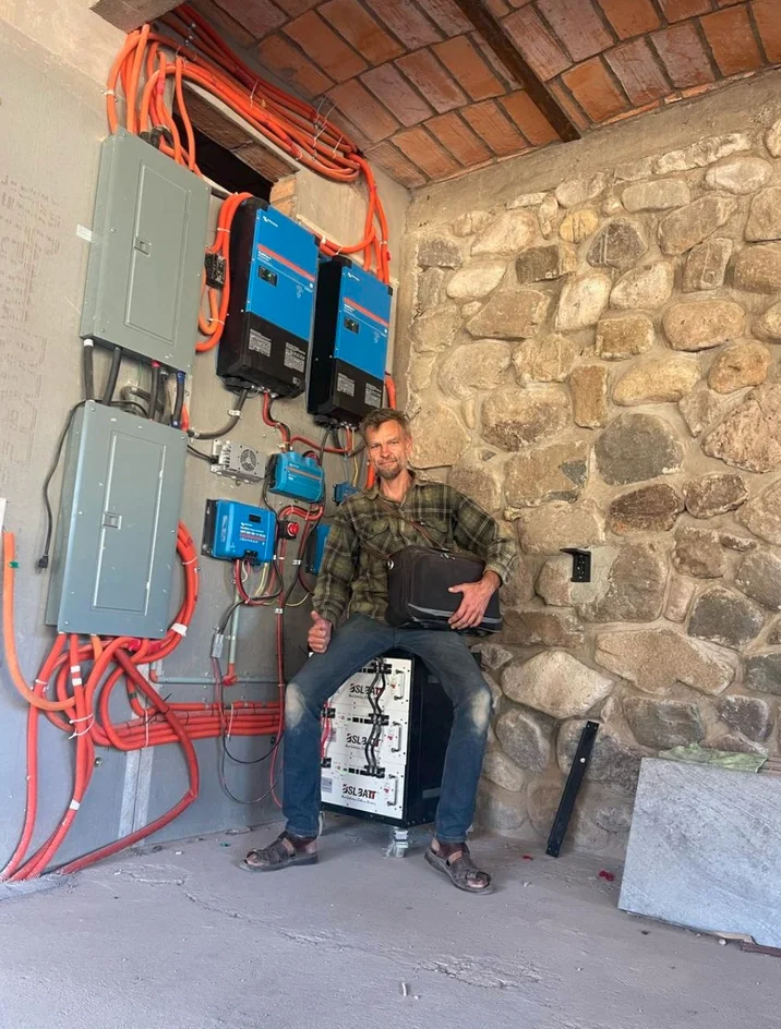 Wall mounted solar battery installation in garage